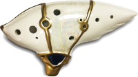 A white ocarina with gold details.